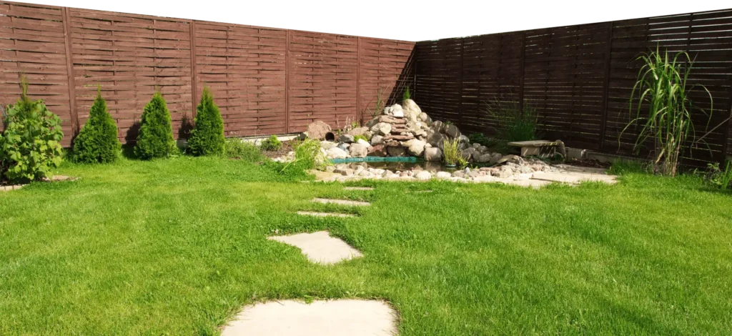 backyard with grass and stepping stones