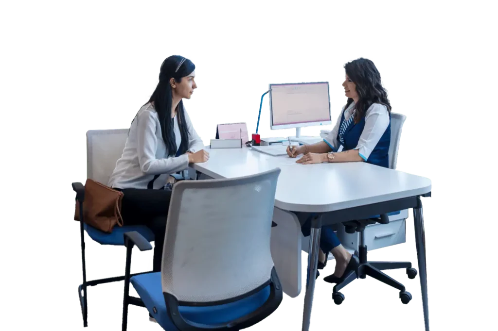 Two people at a desk